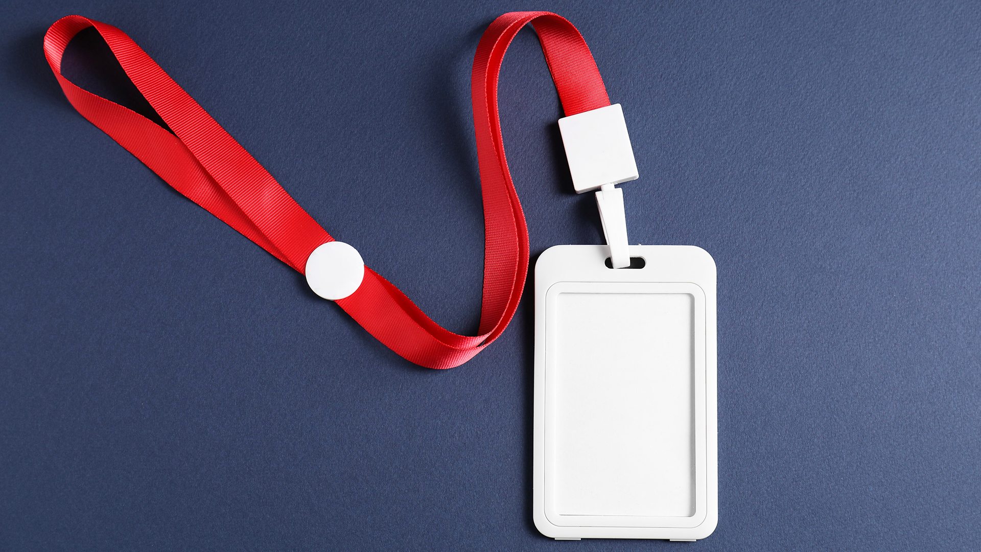 A blank nametag on a lanyard